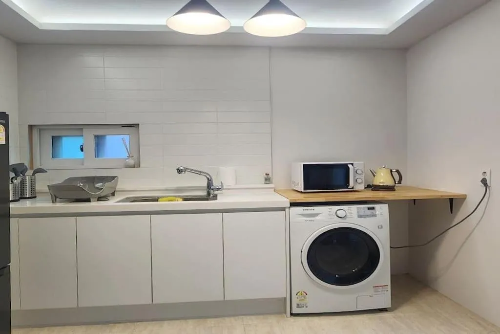 Image 4 of C-5 White Linen House